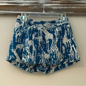Blue, silk, giraffe-print shorts. Beautiful, rich color. Super fun print.